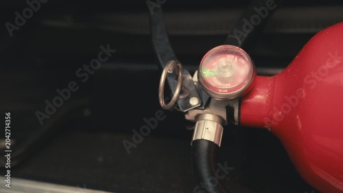 Close-up of a fire extinguisher pressure gauge