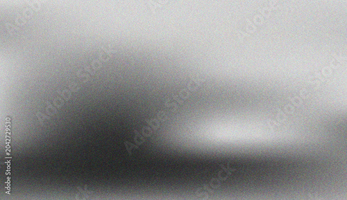 Smooth gray gradient with subtle noise texture creating an elegant abstract visual for creative modern designs