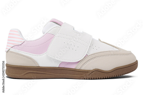 Casual shoes in a combination of cream and pink without laces with brown soles isolated on a white background