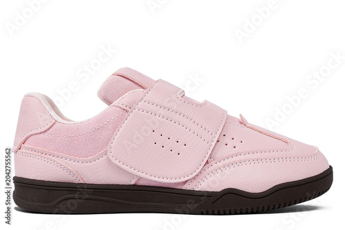 Salmon pink casual shoes without laces with black soles isolated on white background