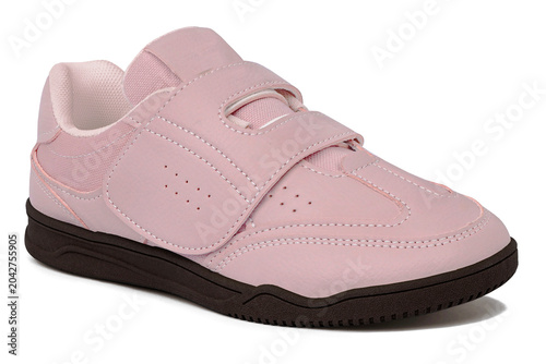 Salmon pink casual shoes without laces with black soles isolated on white background