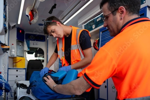 First responders preparing medical equipment