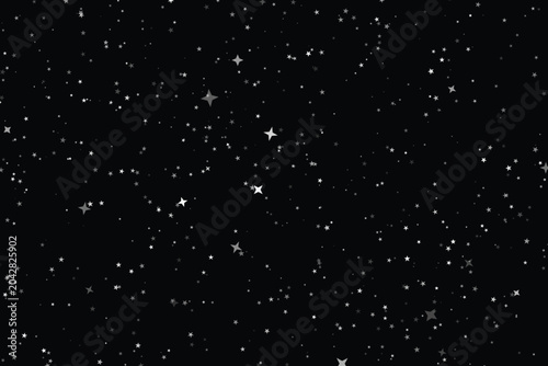 Scattered silver and white stars on a deep black background, starfield night sky celestial
