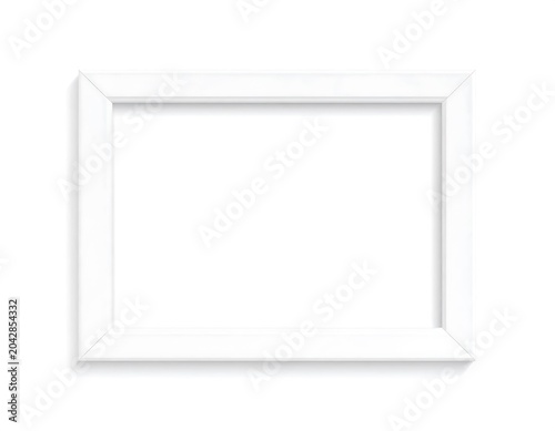 A rectangular, empty, white picture frame lies flat on a white surface, casting a subtle shadow. The perspective is from above