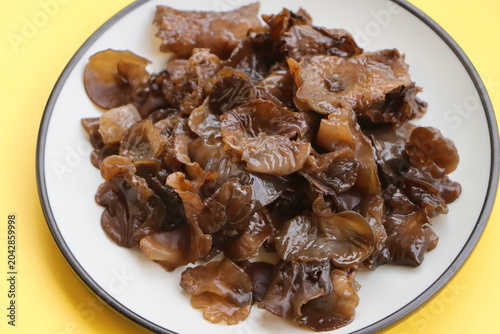Edible jelly ear mushrooms. Fresh wood ear mushrooms on a plate, ingredient for Asian cuisine
