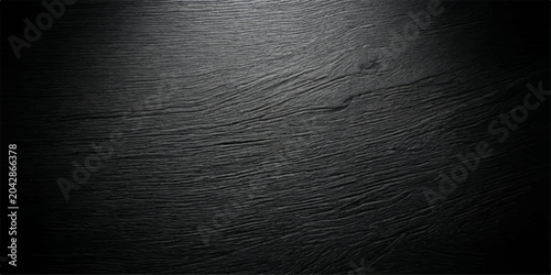 Billede på lærred Dark textured slate surface with subtle grain and soft spotlight, evoking a sense of depth and raw material