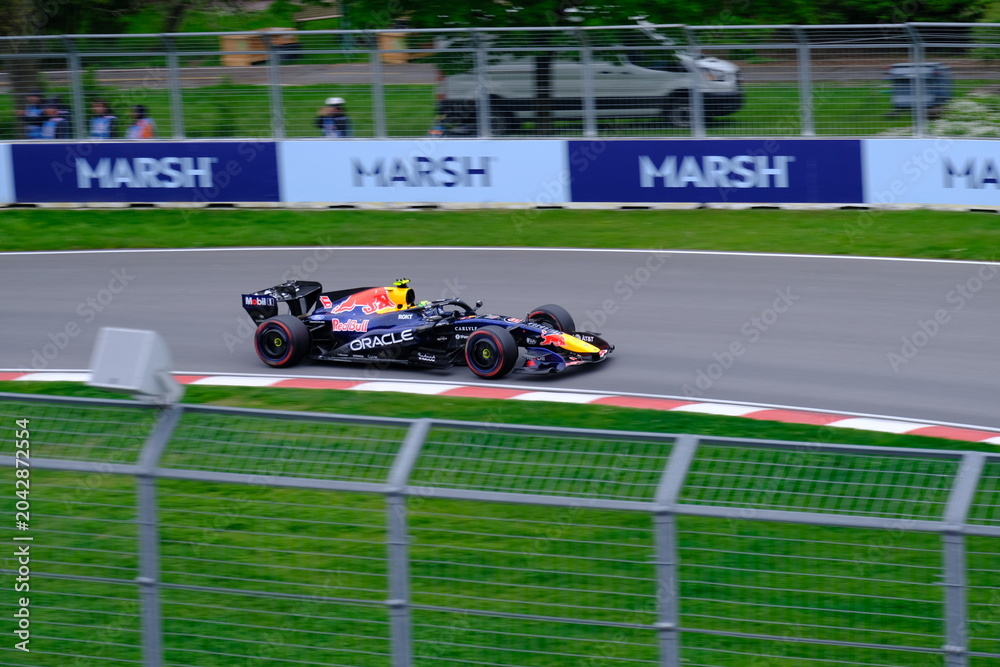 Naklejka premium May 24, 2025, Montreal, Canada: Red Bull Racing Formula 1 car during by Hadjar or Verstappen, demonstration run at Circuit Gilles Villeneuve. g.