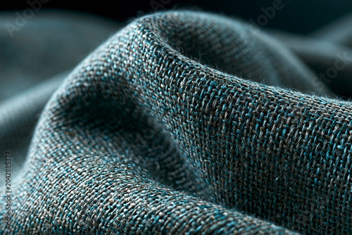 Teal burlap folds with crisp woven surface