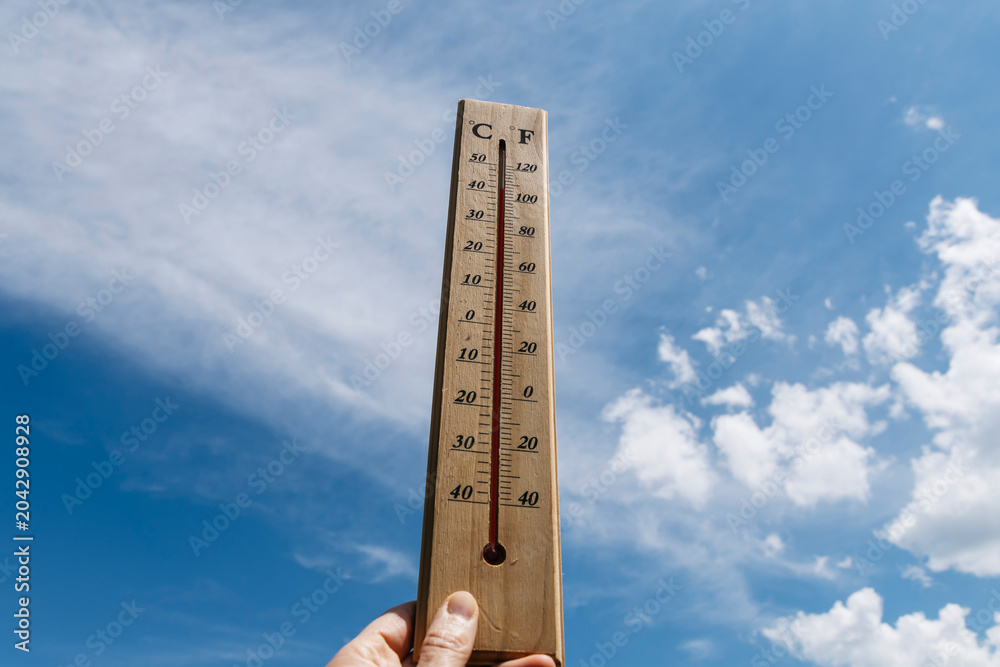 Fototapeta premium Thermometer over 38 degrees, summer heat wave