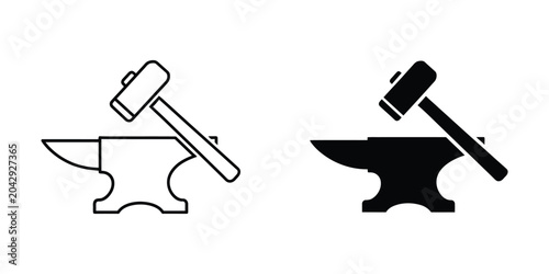 Bild auf Leinwand Blacksmith hammering on anvil with mallet and tongs