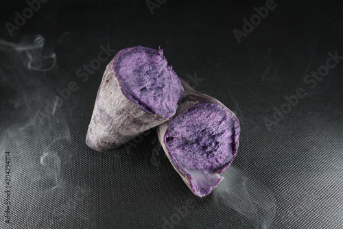 Purple Sweet Potato on black background