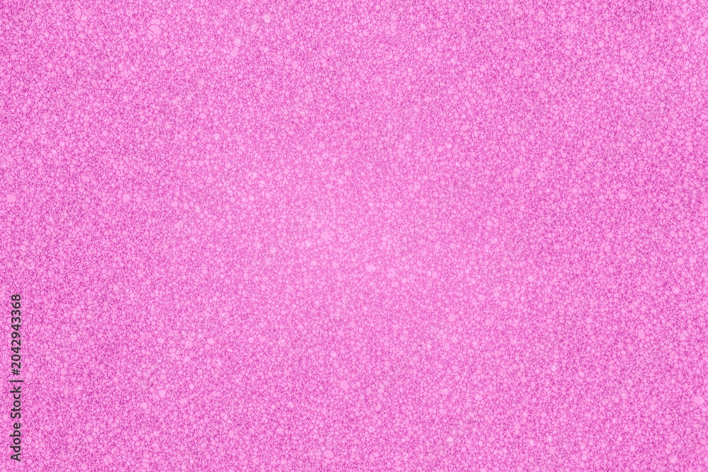 Fototapeta premium pink color backdrop: close up of chaotic sponge texture