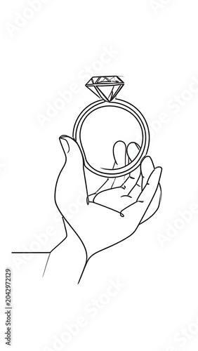 A hand holding a ring box with a diamond