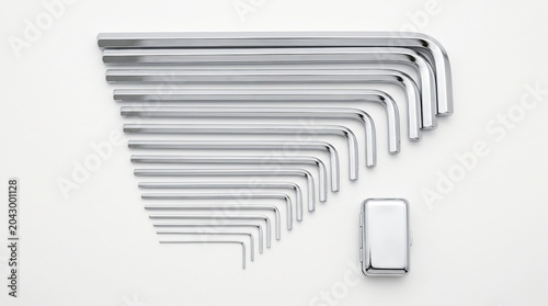 Organized metal hex key wrench set arranged in fan shape on white background