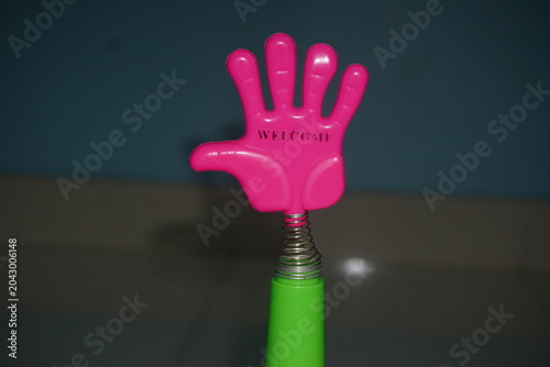 Photos Mini plastic hand clap toy candy combines playful spring-action clapping fun with sweet confectionery treats