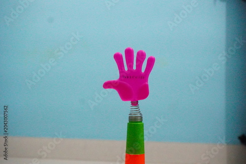 Tableau sur toile Mini plastic hand clap toy candy combines playful spring-action clapping fun with sweet confectionery treats