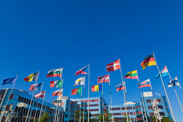 Luxembourg, European flags and parliament building in background