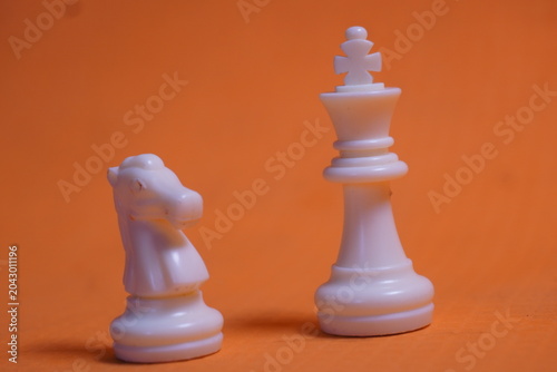 Traditional chess pieces arranged for strategy gameplay, enhancing concentration, logic, and skill development.