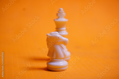 Traditional chess pieces arranged for strategy gameplay, enhancing concentration, logic, and skill development.