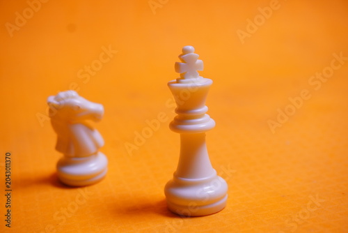 Traditional chess pieces arranged for strategy gameplay, enhancing concentration, logic, and skill development.