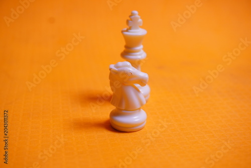 Traditional chess pieces arranged for strategy gameplay, enhancing concentration, logic, and skill development.