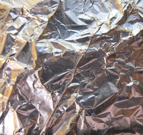 Crumpled Silver Aluminum Foil Texture Background