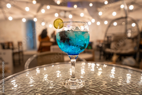Tablou pe pânză Exotic luxury cocktail served in a unique glass at an upscale night bar