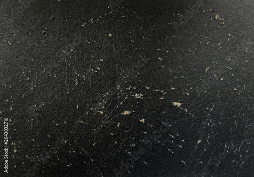 Scratched Black Leather Texture Background with Damaged Weathered Surface