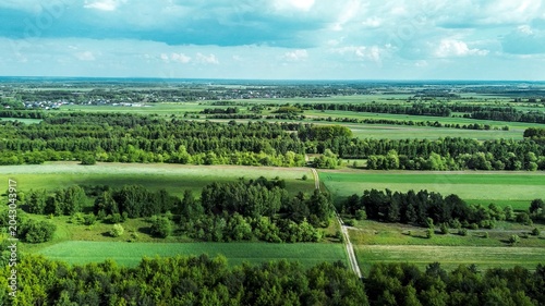 Mixed farmland and forest in early spring