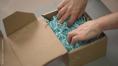 Tea packaging. DIY box. Cardboard box. Slow motion video.. High quality 4k footage