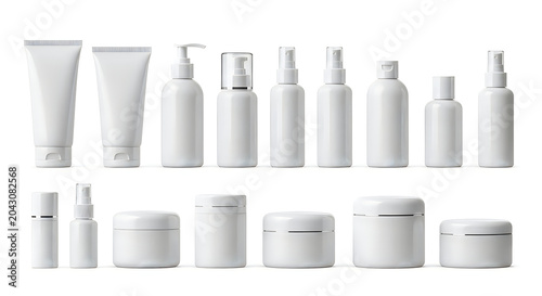Collection of blank white cosmetic bottles and containers for skincare and beauty.
