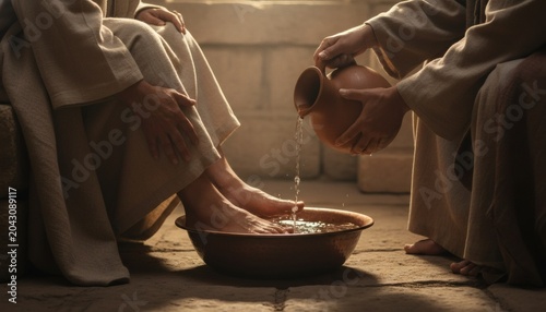 A biblical scene of Jesus washing the feet of his disciple in a warm ancient stone room, representing the Christian concept of humility, love, and servant leadership