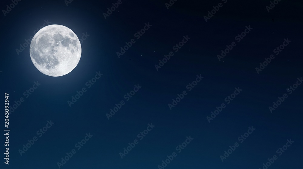 Naklejka premium A bright full moon shines in the dark night sky, casting a soft glow.