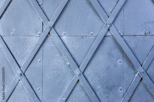 Metallic door with rhombus shape texture background