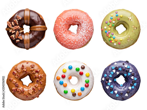 Slika na platnu Vibrant and delectable array of colorful donuts featuring various toppings and glazes