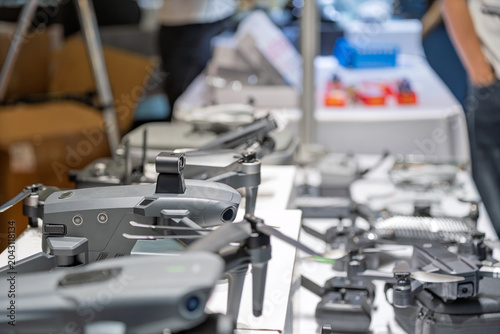 Multiple aerial drones on display at exhibition event