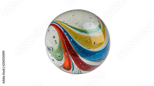 Obraz na plátne Classic colorful vintage glass marble ball toy object close up macro isolated on