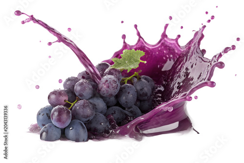 Fresh purple grapes with dynamic fruit juice splash beverage vitamins refreshing delicious viticulture vineyard splashing isolated background advertising commercial vegetarian nutritious