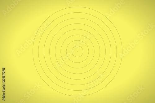 Abstract concentric circles pattern on vibrant yellow background  