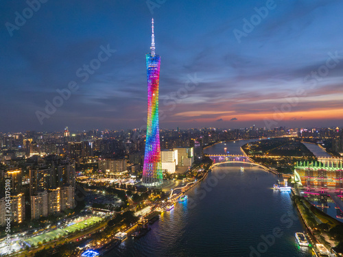 Aerial View of Guangzhou Tower Illuminated at Dusk over the Pearl River
