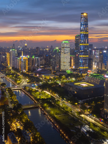 Aerial View of Guangzhou Skyline at Dusk with Vibrant City Lights
