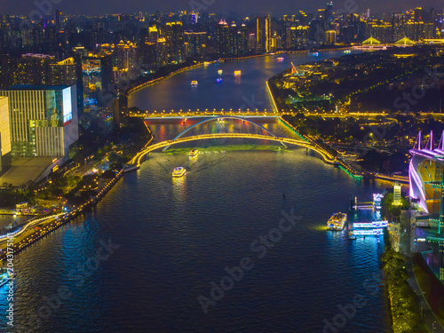Aerial View of Guangzhou Skyline at Night with Illuminated Bridges and River