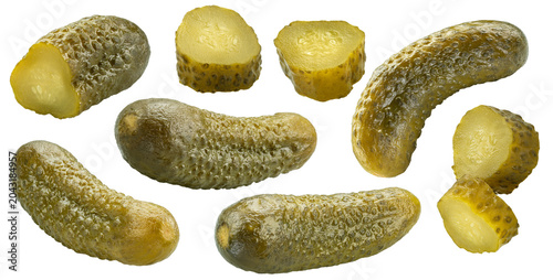 Картината върху платно Pickled cucumbers and sliced gherkins isolated on white background