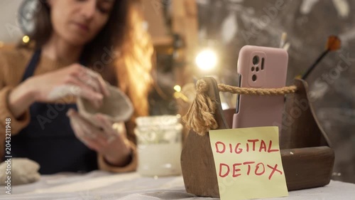 Digital detox through clay sculpting hobby. Giving up digital addiction by doing creative pottery craft at home