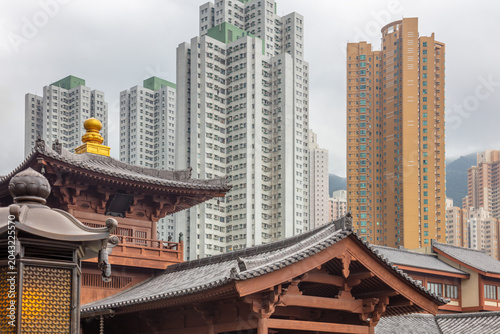 Photography Ancient Temple Rooftops and Residential Skyscrapers in Hong Kong City