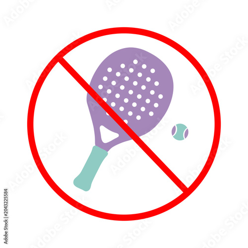 A purple padel tennis racket and a small ball are placed behind a red prohibition sign indicating that beach sports or paddle games are not allowed