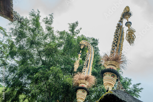 Indonesian statue in a temple with offerings