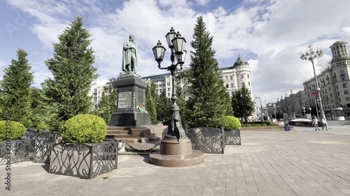 Moscow, Russia, 25 May 2026. Monument to Alexander Pushkin on Pushkin Square surrounded by cypress trees and decorative plants as part of the “Summer in Moscow” festival. The scene highlights a blend 