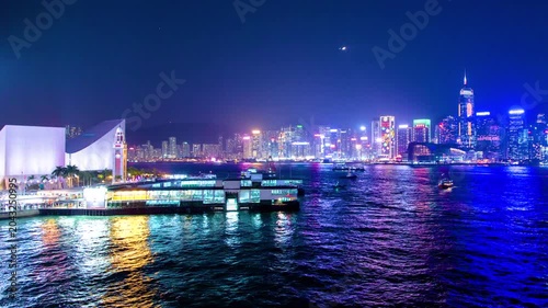 Stunning vibrant night cityscape of Hong Kong Victoria Harbour.
Signature view of Hong Kong, ferry pier at Tsim Sha Tsui, facing the Hong Kong Convention and Exhibition. Ferry, ship and boat riding on
