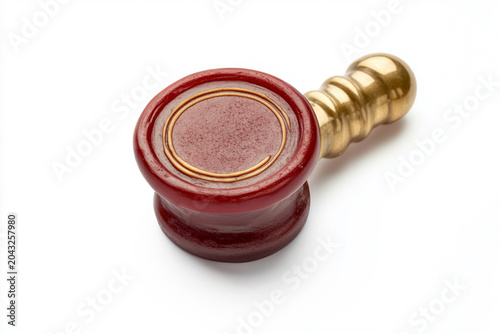 Red and gold wax seal stamp on white background
